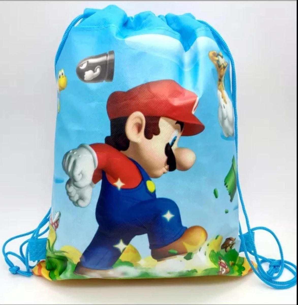 NINTENDO Super Mario Rugtas Met Koordjes - Gym Tas - Rugtas Kind - Zwemtas - Super Mario | 27,5 X 35 Cm 3 NINTENDO Super Mario Rugtas Met Koordjes - Gym Tas - Rugtas Kind - Zwemtas - Super Mario | 27,5 X 35 Cm